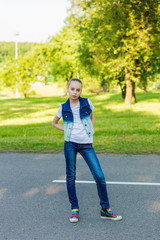 Fototapeta premium portrait of a beautiful girl outdoors in sammer