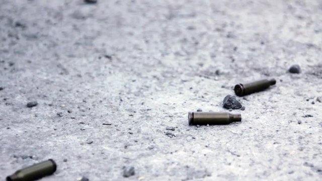 Bullet Shells Falling on the Ground