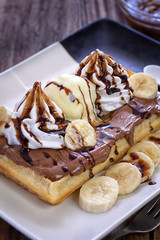 Belgian Waffles with banana and vanilla ice cream