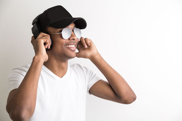 Smiling black guy with headphones