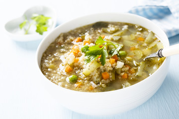 Soup with bulgur and pickled cucumber