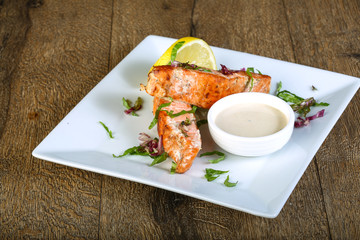 Baked salmon with sauce