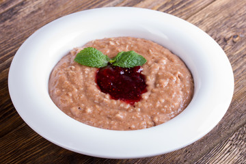 Oatmeal with chocolate and jam