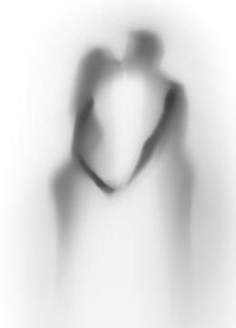 Slihouette of a lover couple, kiss