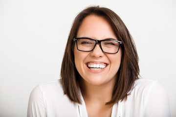 Obraz premium Portrait of girl playing ape over white background.