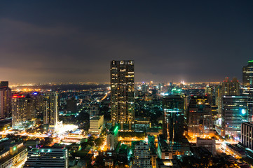 Fototapeta na wymiar Aerial view of Bangkok city at night. Modern megalopolis cityscape at night