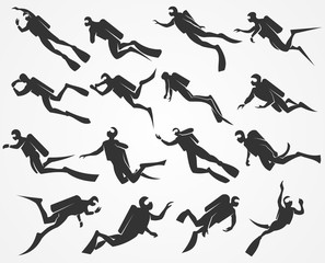 Vector silhouettes scuba divers swimming in the sea or ocean