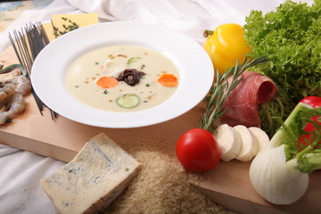 Italian vegetable soup, surrounded by fresh food