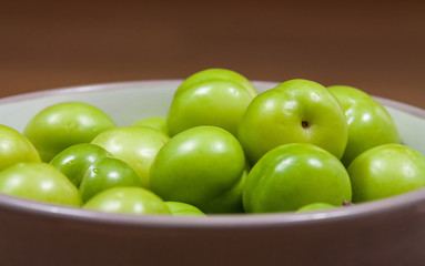 cherry-plums on the table