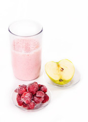 blender with the frozen fruits
