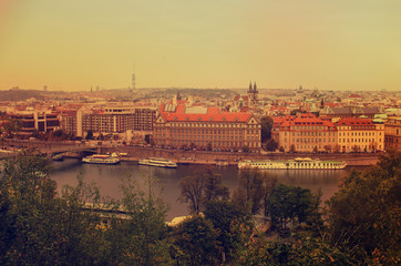 Center of Prague city at autumn with red roofs, european travel landscape background in vintage style