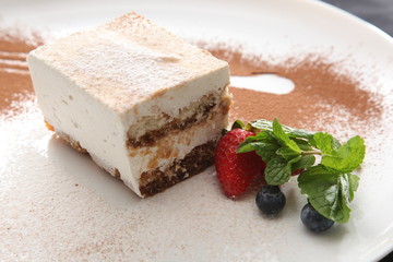 Tiramisu dessert with berries