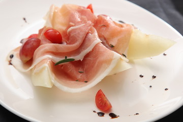shavings of meat with melon