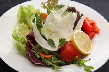 vegetables fennel and lemon on the plate