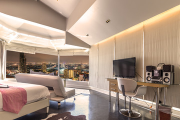 Modern style of bedroom with high view of Bangkok city