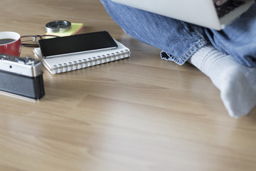 man with laptop computer, coffee cup and eyeglasses