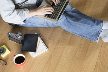 Fototapeta premium man with laptop computer, coffee cup and tablet