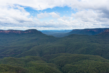 Obraz na płótnie Canvas Australian eucalyptus forest and rock formations viewed from Echo Point lookout. Iconic Australian tourist attraction in Blue Mountains National Park, NSW, Australia