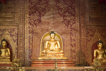 golden buddha statue in buddhism temple