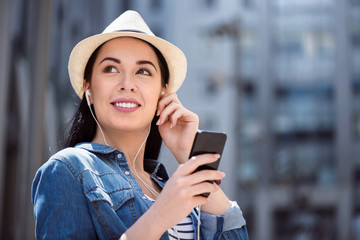 Pleasant cheerful woman having a walk