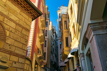 Fototapeta na wymiar Colorful houses on narrow streets of old Istanbul Karakoy district