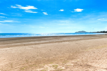 Summer time on sky and sand of beach