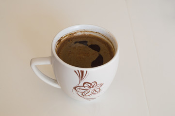 Coffee cup on table