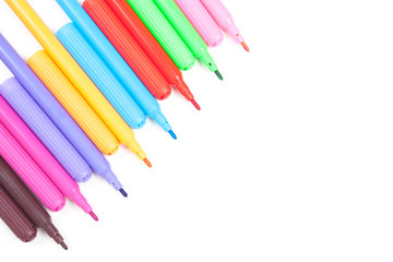 Colored markers isolated on white background