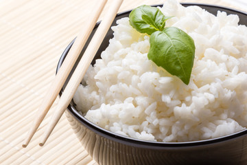 cooked rice in black bowl