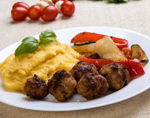 polenta with meatballs and vegetables