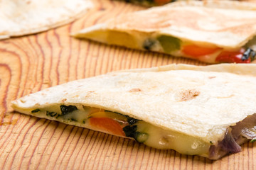 quesadilla on wooden table