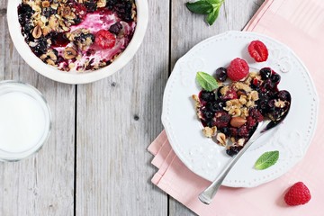 Berry crumble. Clean-eating gluten free dessert . Superfoods concept.Toned image, selective focus. 