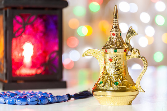 Arabic Coffee pot, muslim prayer beeds and lantern