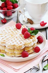 Homemade waffles with fresh raspberry.Selective focus