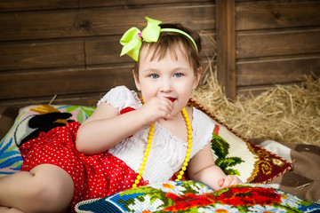 The baby, hay, cushions, country