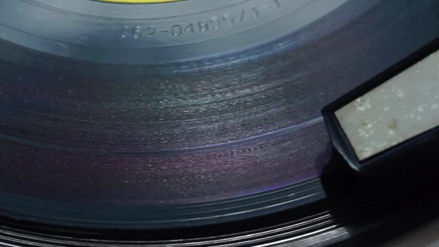 Music vinyl spinning on electrophone