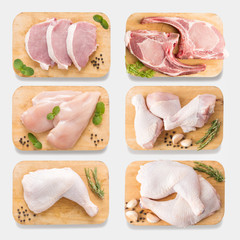 Mockup raw chicken and pork on cutting board set on  isolated 