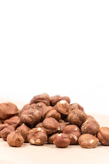 Bunch of hazelnut on the cutting board copy space