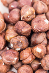 Extreme closeup macro bunch of hazelnuts background