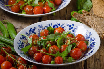 Salad of arugula and cherry tomatoes