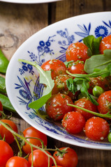 Salad of arugula and cherry tomatoes