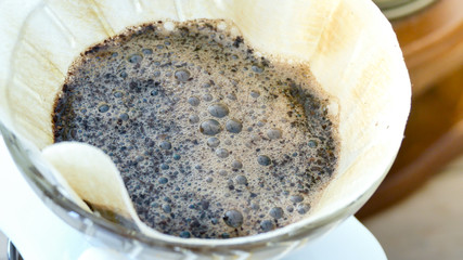 Brewing coffee with hot water