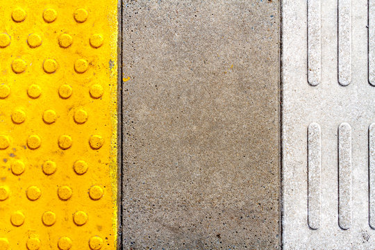 Fototapeta Warning tiles on railway station