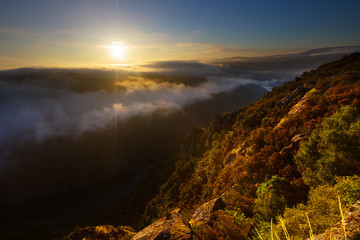 Misty dawn over  mountains