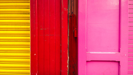 Abstract, colorful composition from wooden doors