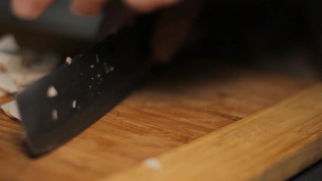 Knife Cut Mushrooms Cooking - cutting mushrooms in the kitchen.