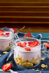 Homemade yogurt with corn flakes and berries, healthy eating yog