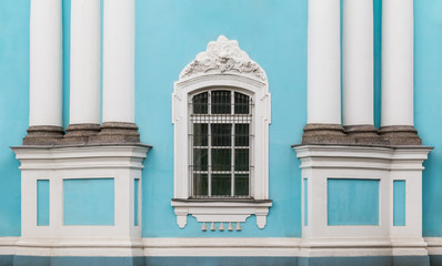 Window and columns on facade of of St. Nicholas Naval Cathedral front view, St. Petersburg, Russia.