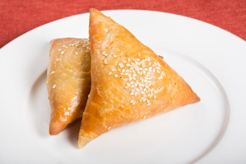 Samosa on white plate
