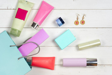 Woman's cosmetics and accessories on wooden background. Beautifu